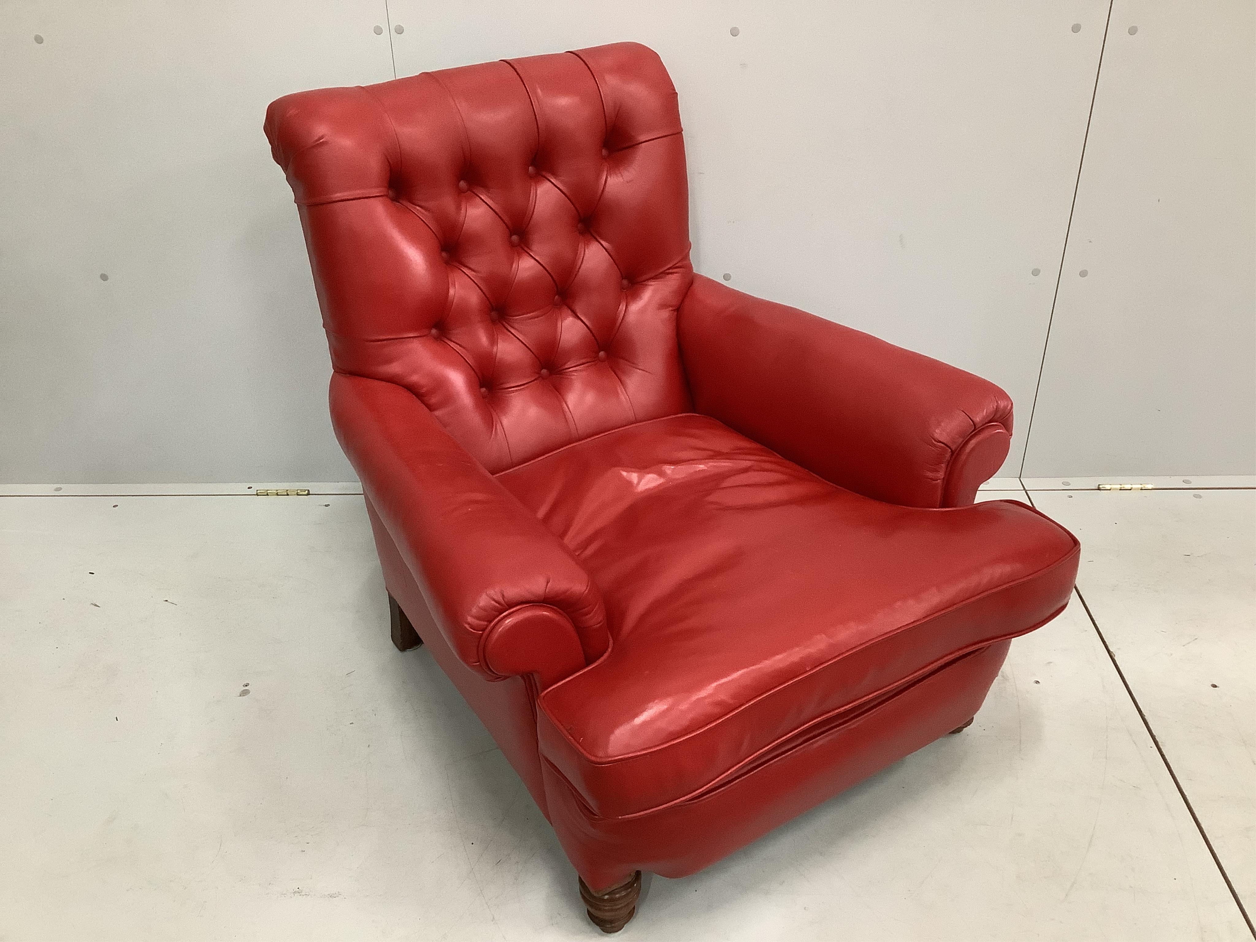 A Victorian deep buttoned red leather armchair, width 90cm, depth 92cm, height 88cm